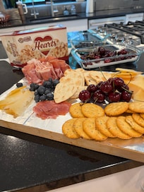 I made us our own Cheese Board - I had the kitchen room to get a little fancy. =}