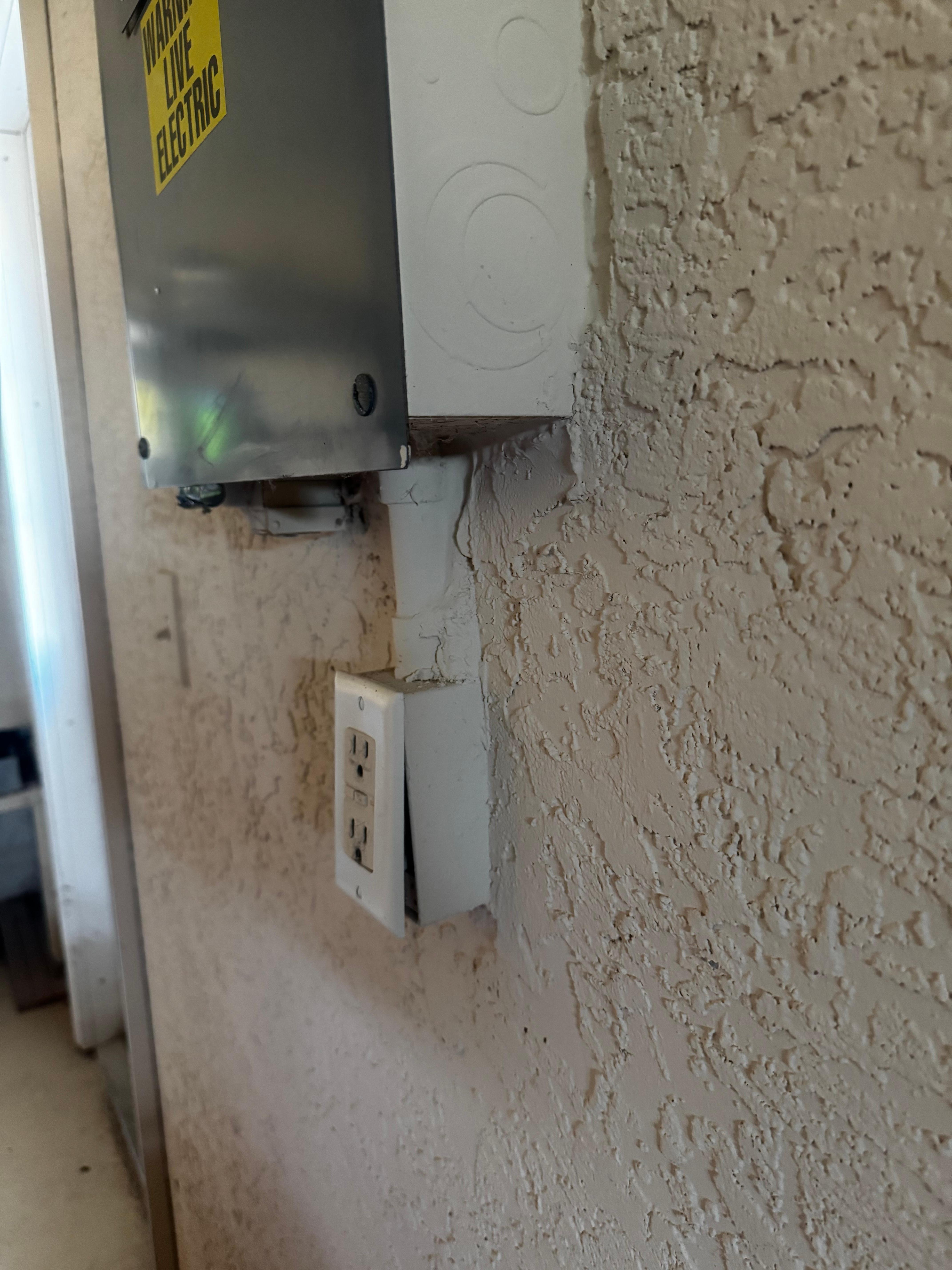 Unsafe, pretty sure would not pass any electrical inspection.