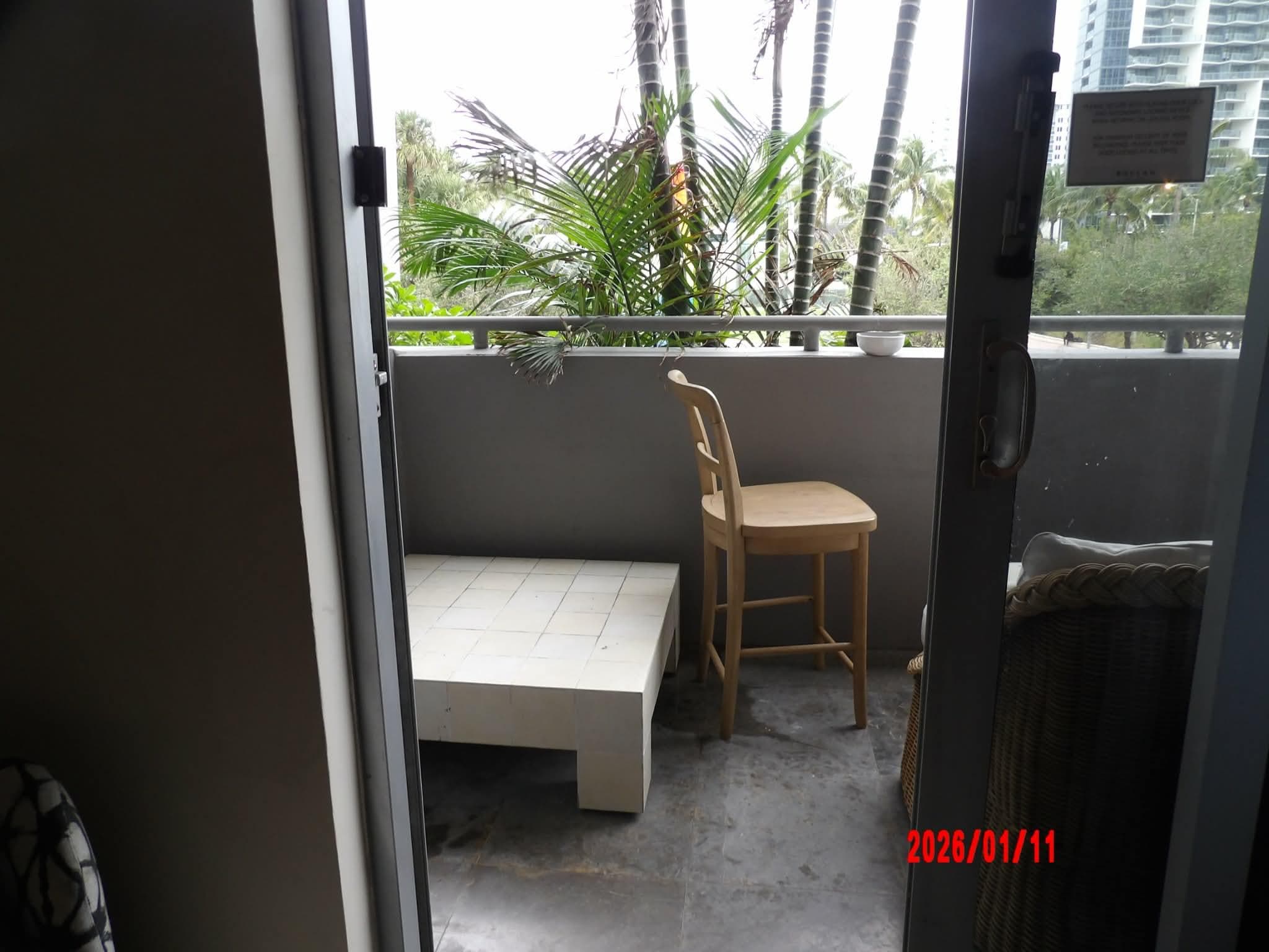 Patio furniture that didn't fit. We moved the chair out there for someplace clean to sit.