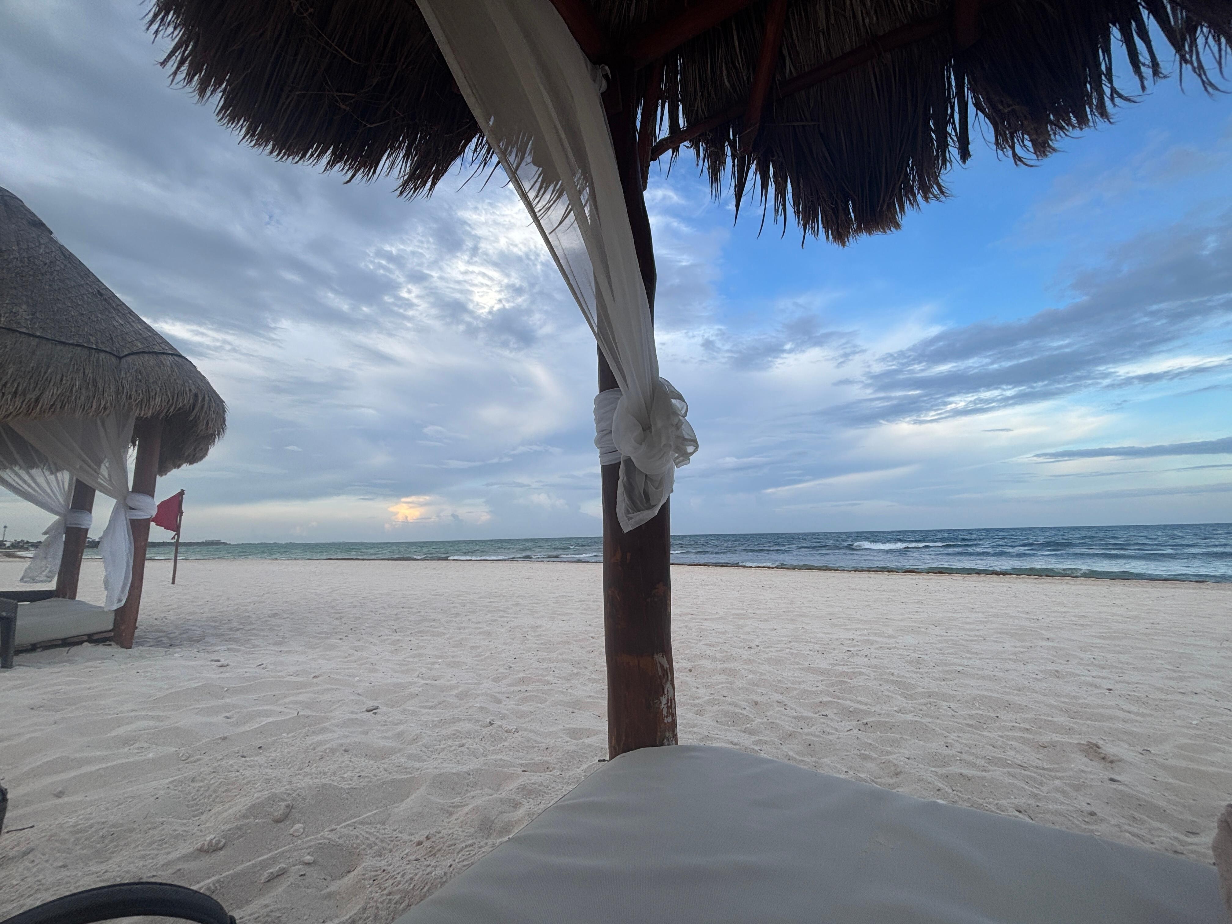 Beach by sunset bar.