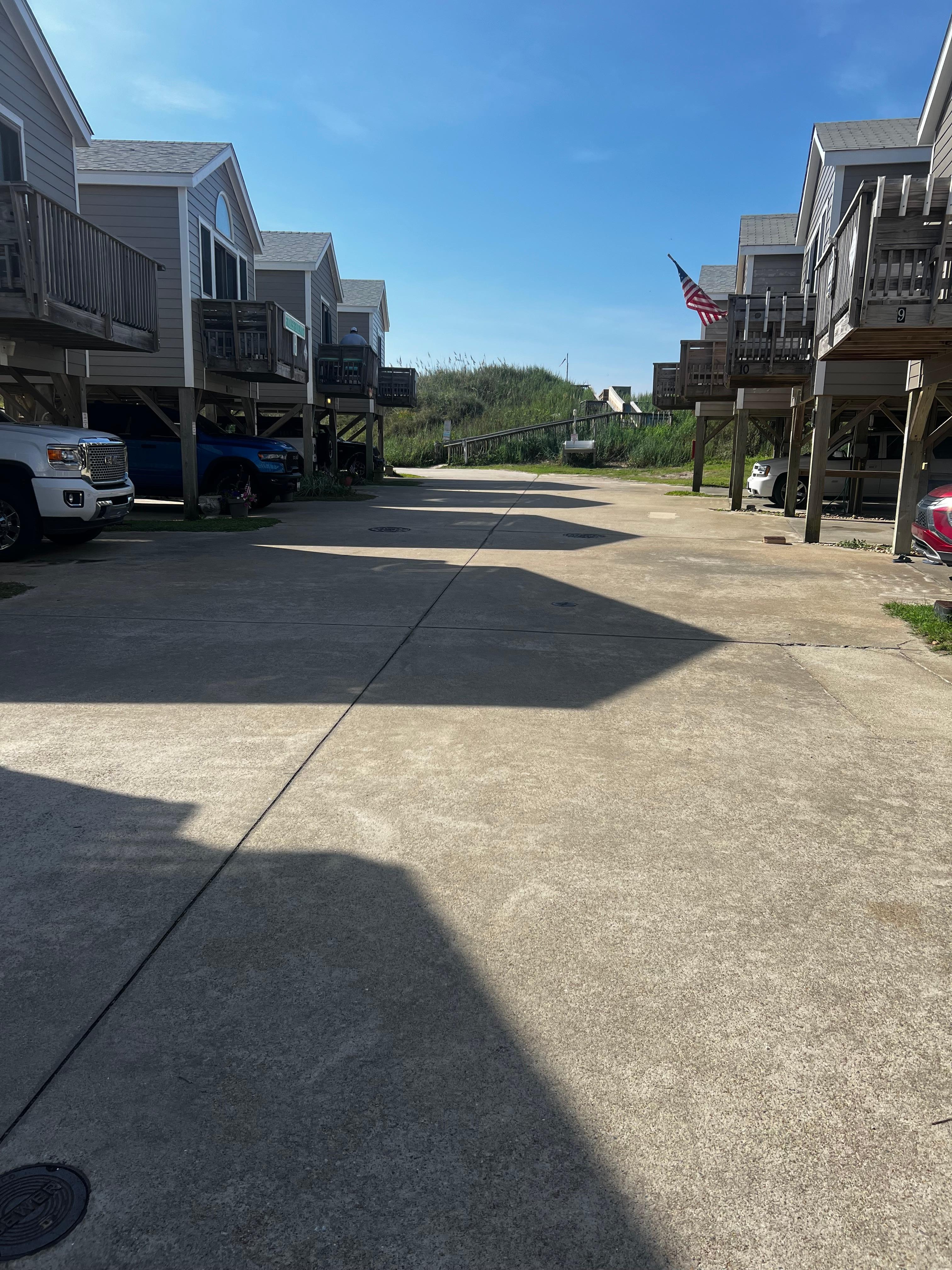 Drive way into the bungalows on both sides 