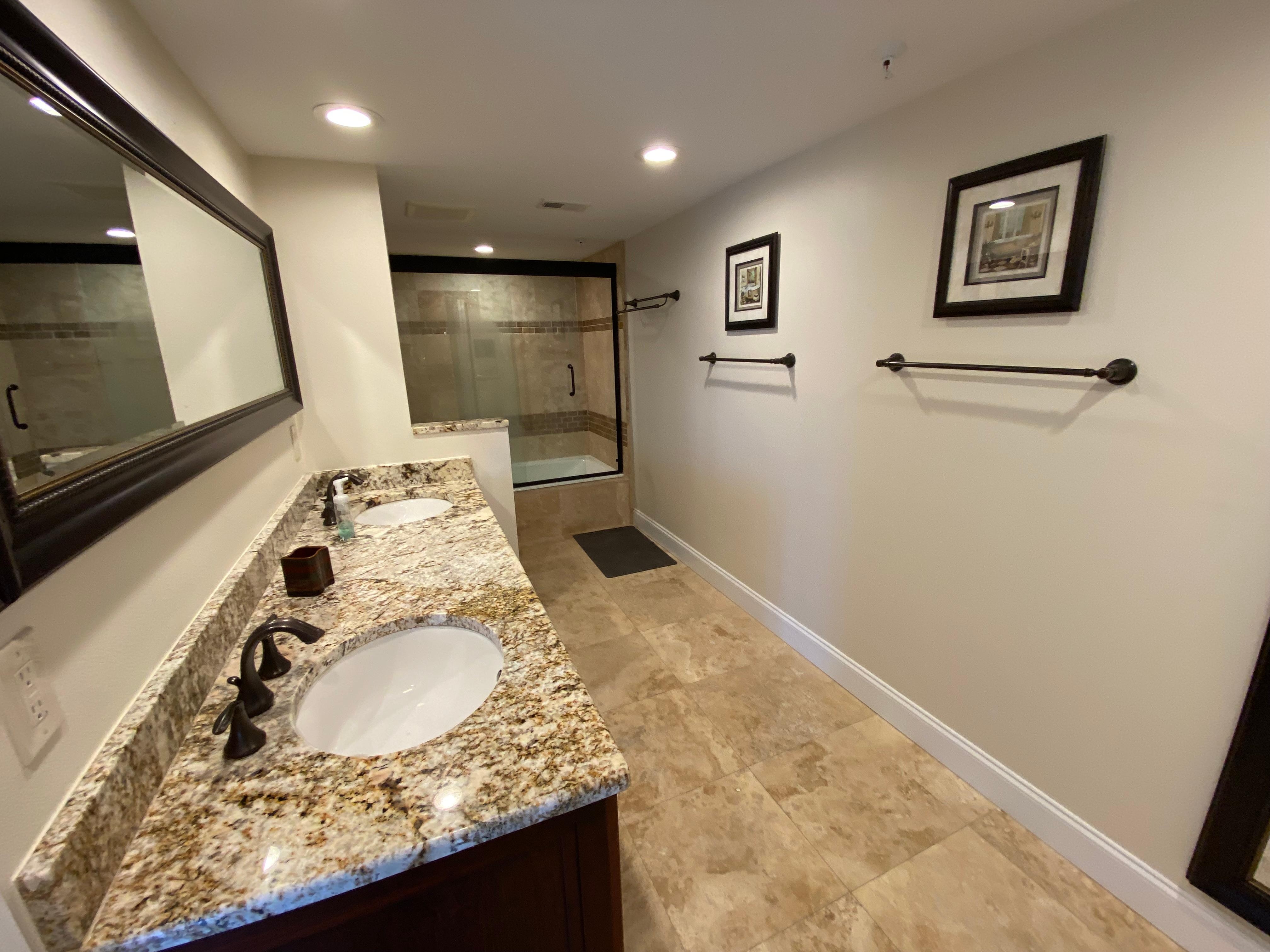 Very nice master bathroom with his/her sinks