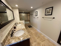 Very nice master bathroom with his/her sinks