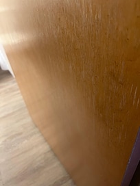 Brown specks all over bathroom door
