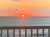 Looks like the sun is sinking into the Gulf. Incredible view!!