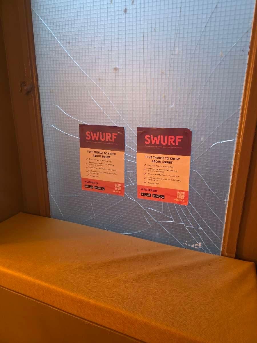 Smashed window in stairwell