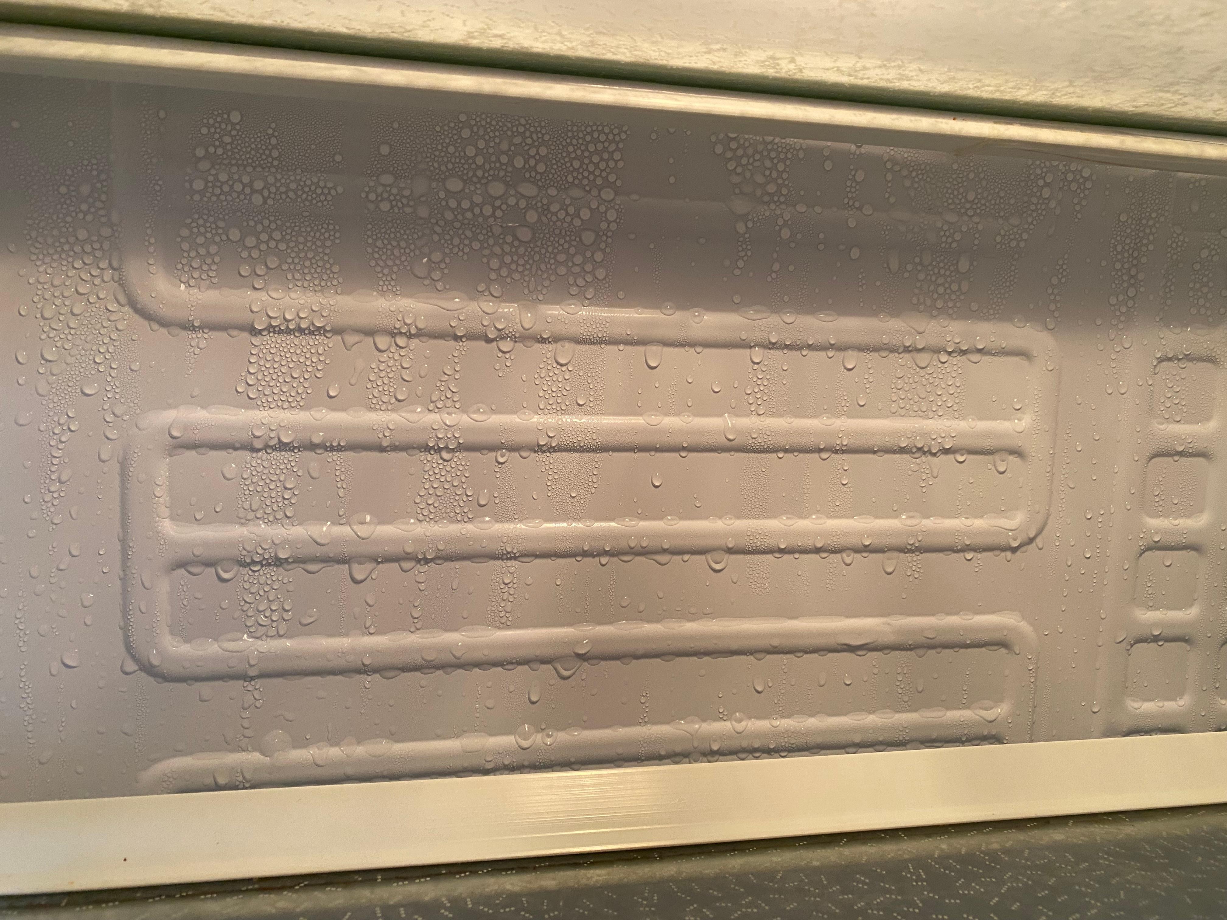 noisy, dripping water in back of fridge