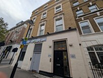 The actual building you'll be staying in, not the pretty one in the photos!