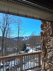 Sitting at the dining room table. Looking at the slopes!