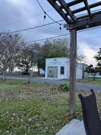 Outside patio area looking across the small street to a historic building.