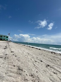 The beach is a turtle sanctuary--no high rises and pretty unpopulated on weekdays.