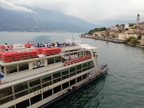 Biggest ferry arriving at Limone Central ferry stop.