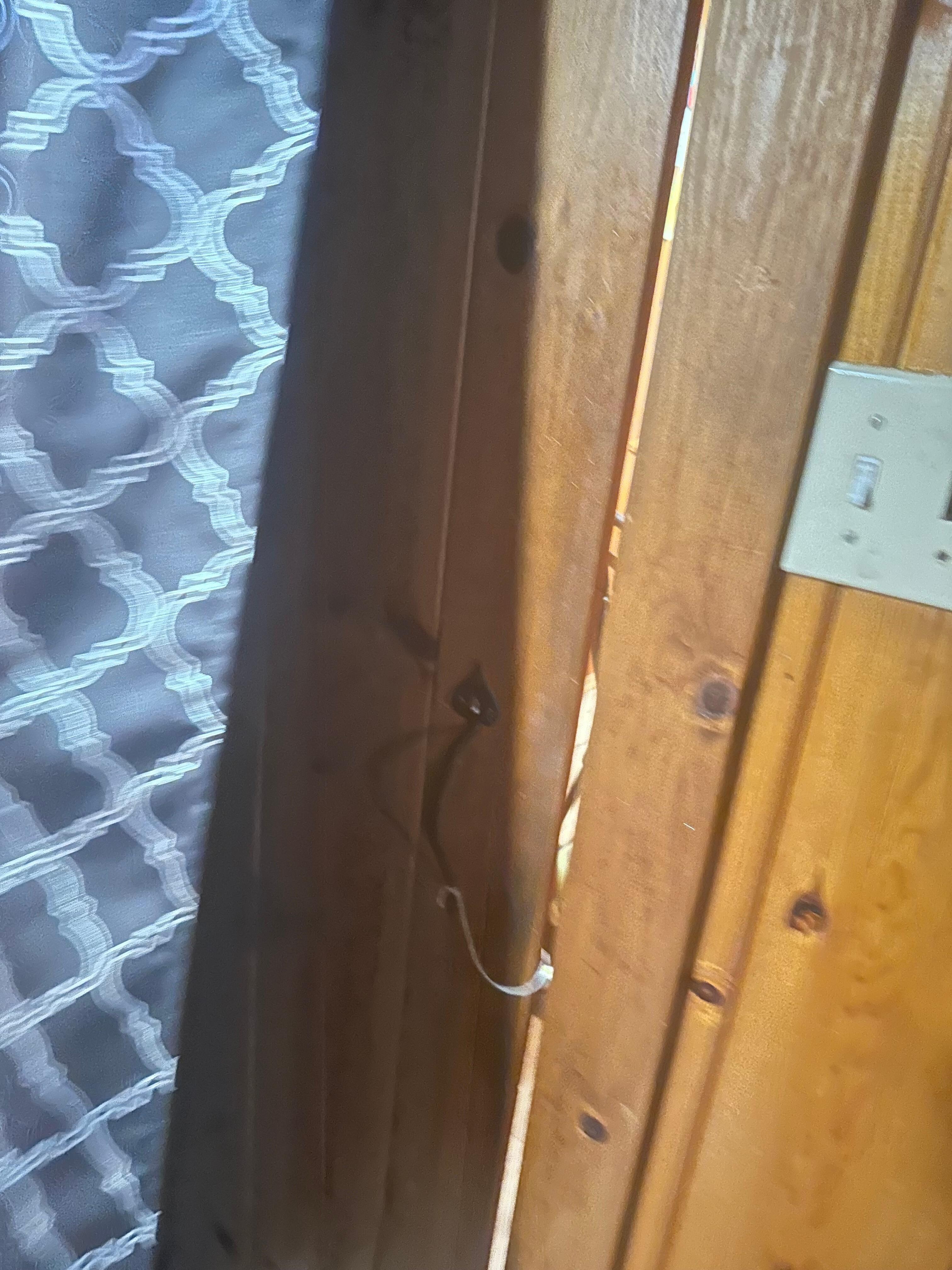 What you see in the door crack is the office. The “door” is not a door and does not close. Anyone can walk directly into the bedroom. 