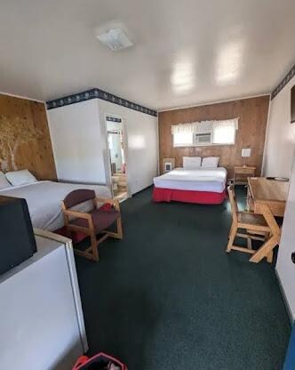 A photo of our room with two queen beds
