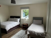 Bedroom 1 with a Queen and a single.