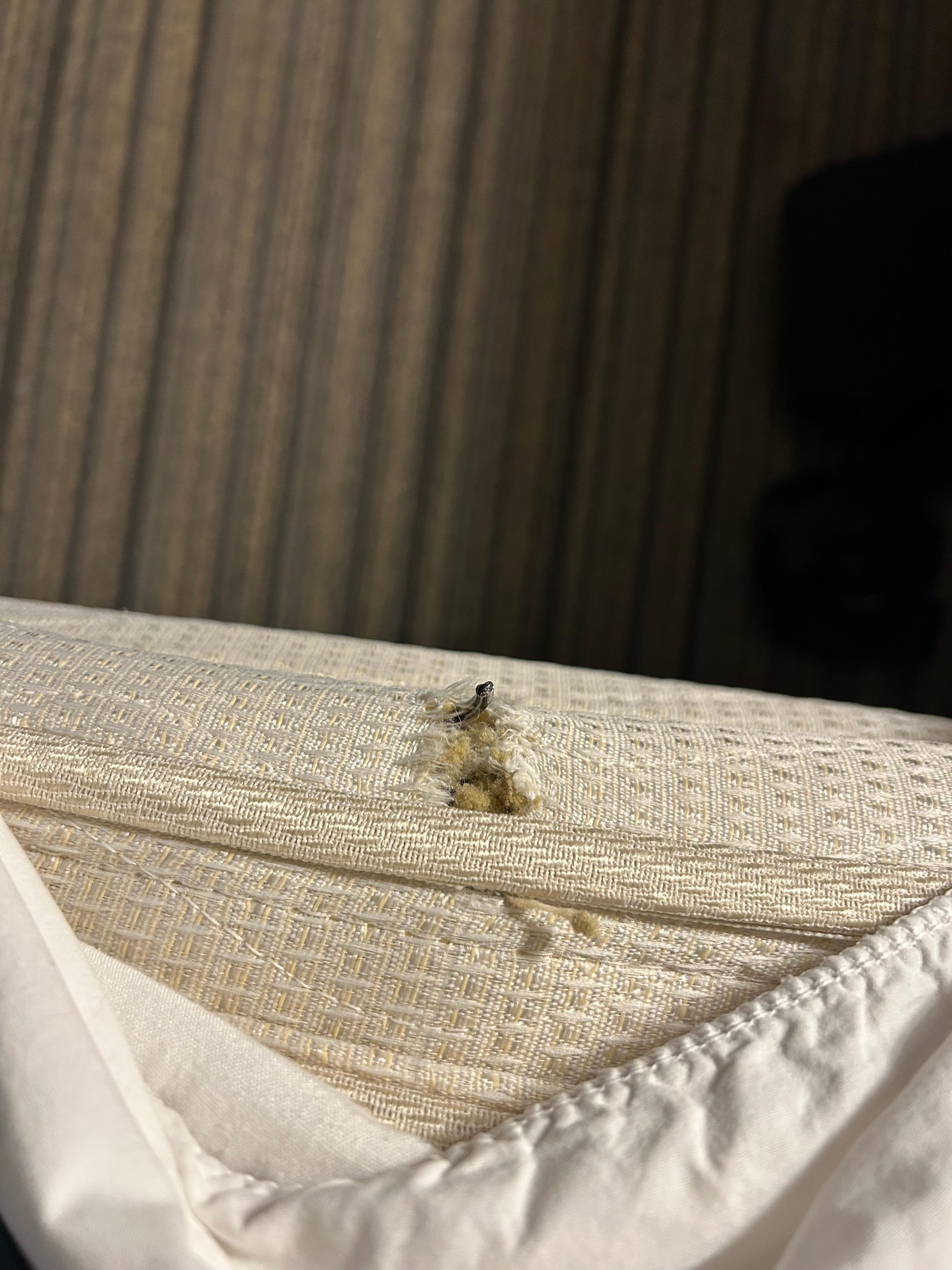 Mattress wire sticking thru side