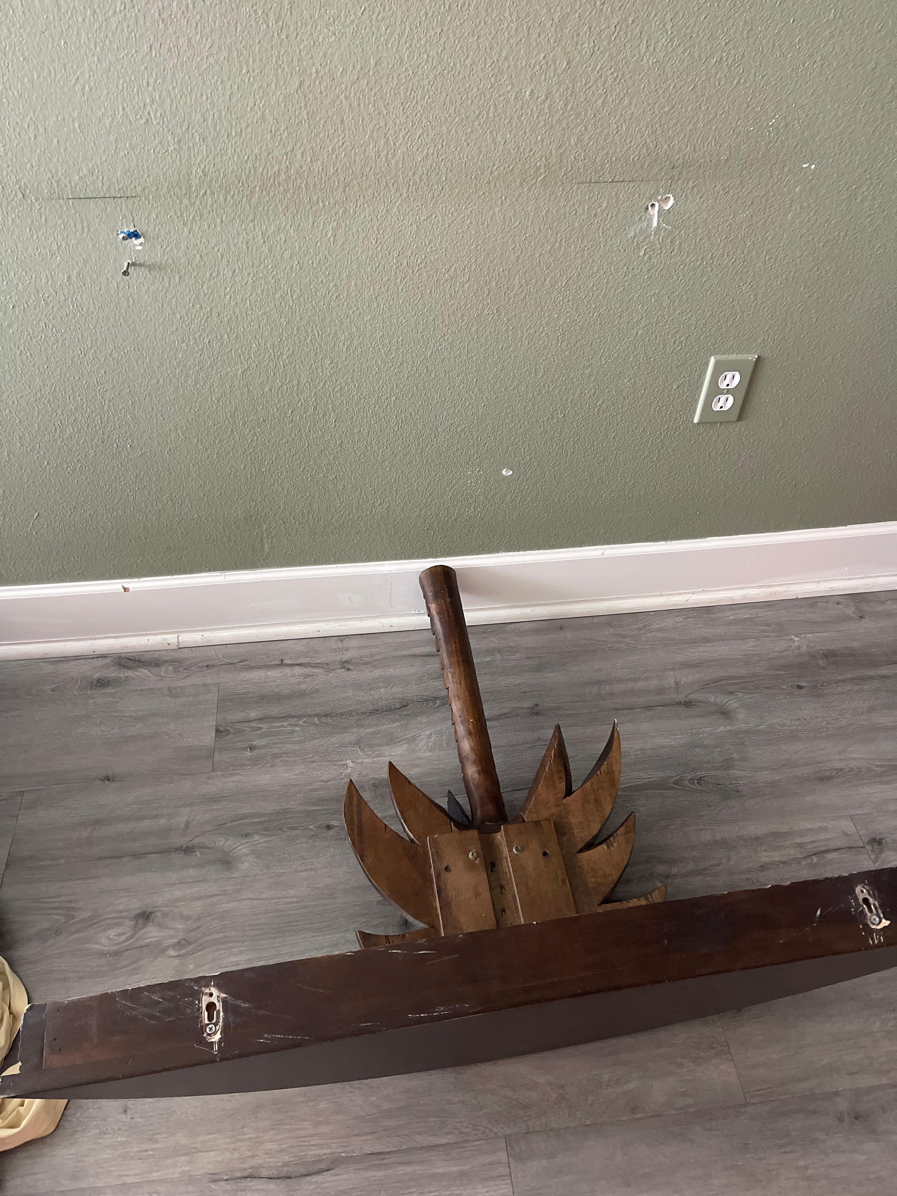 Table that was just sitting in the drywall that fell out each time we walked by it. 