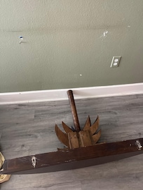 Table that was just sitting in the drywall that fell out each time we walked by it.