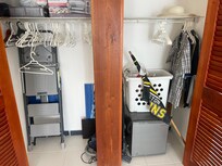 Bedroom closet with owners clothes