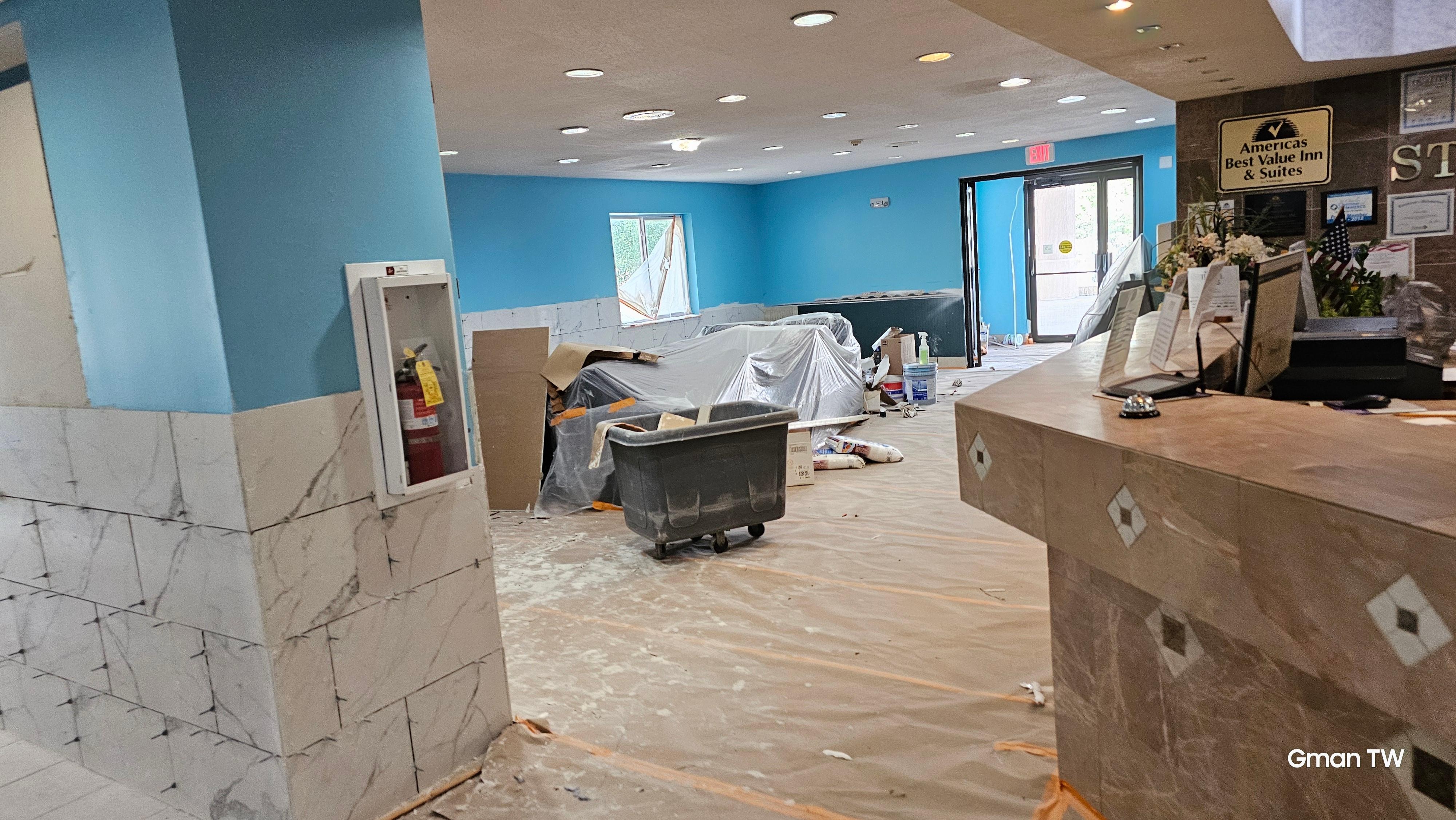 Lobby desk and entry door view from the only elevator 