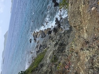 Dangerous cliff drop off. No fence, rope, chain, or sign for safety.