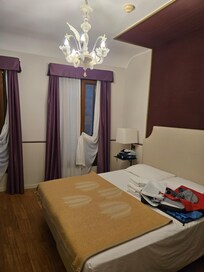 Bedroom has two big windows.