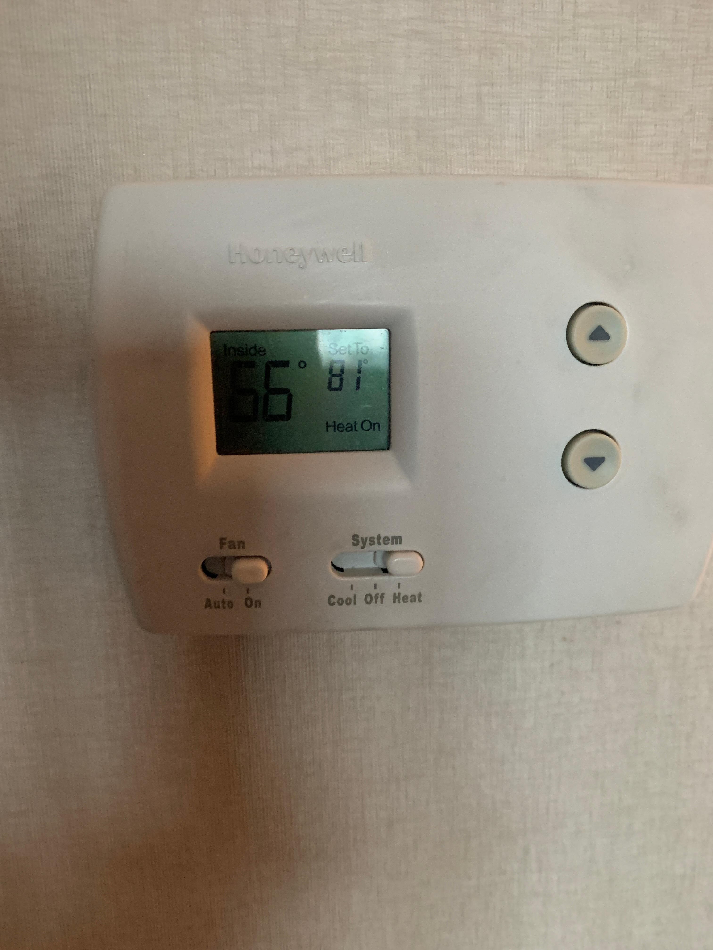 Button was on heat , temp on room was at 65 and went down to 63, we were actually cold on our room