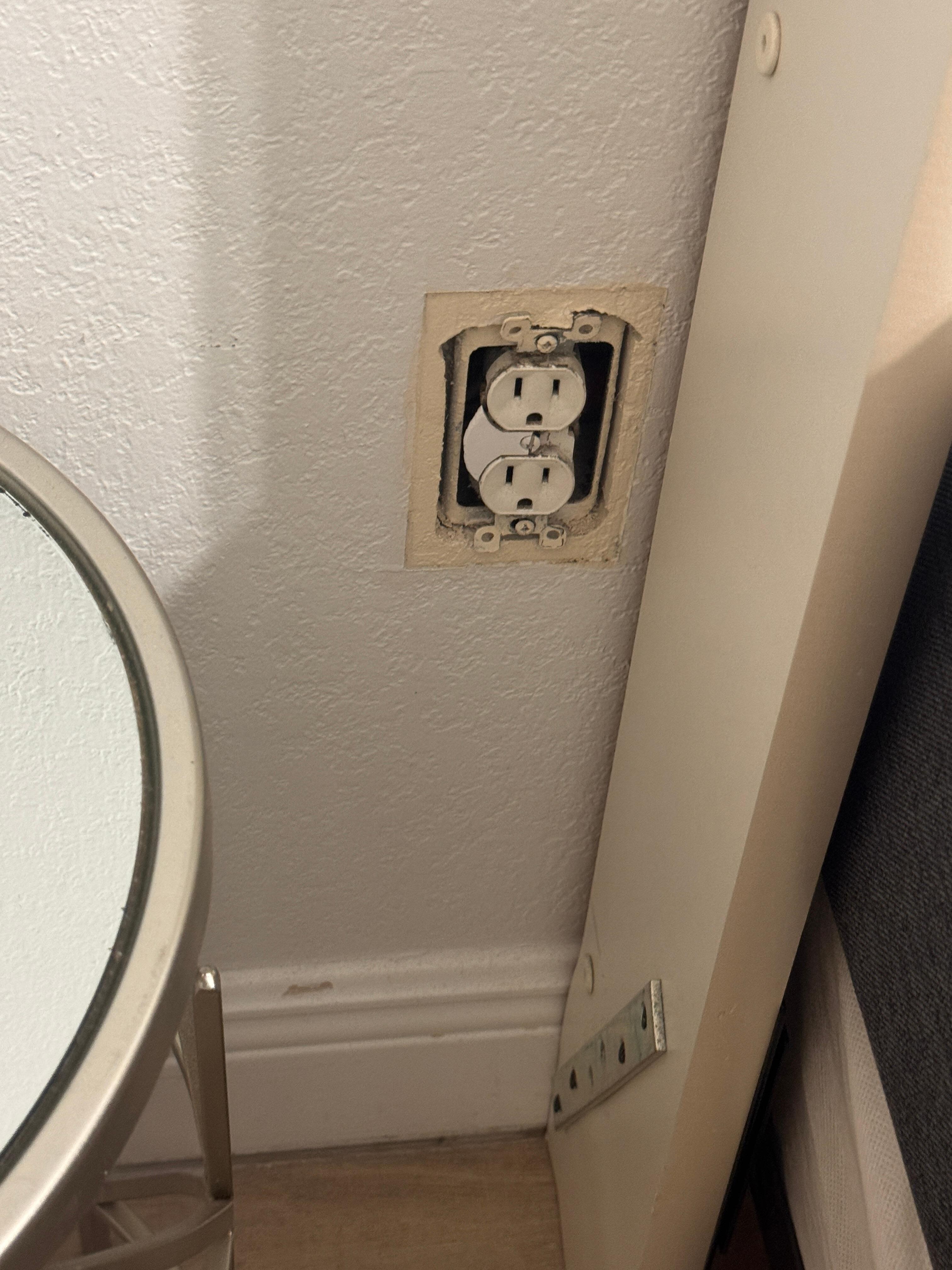 Outlet next to king bed