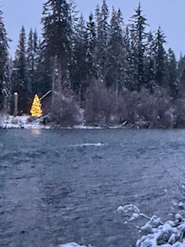 Across river behind cabin