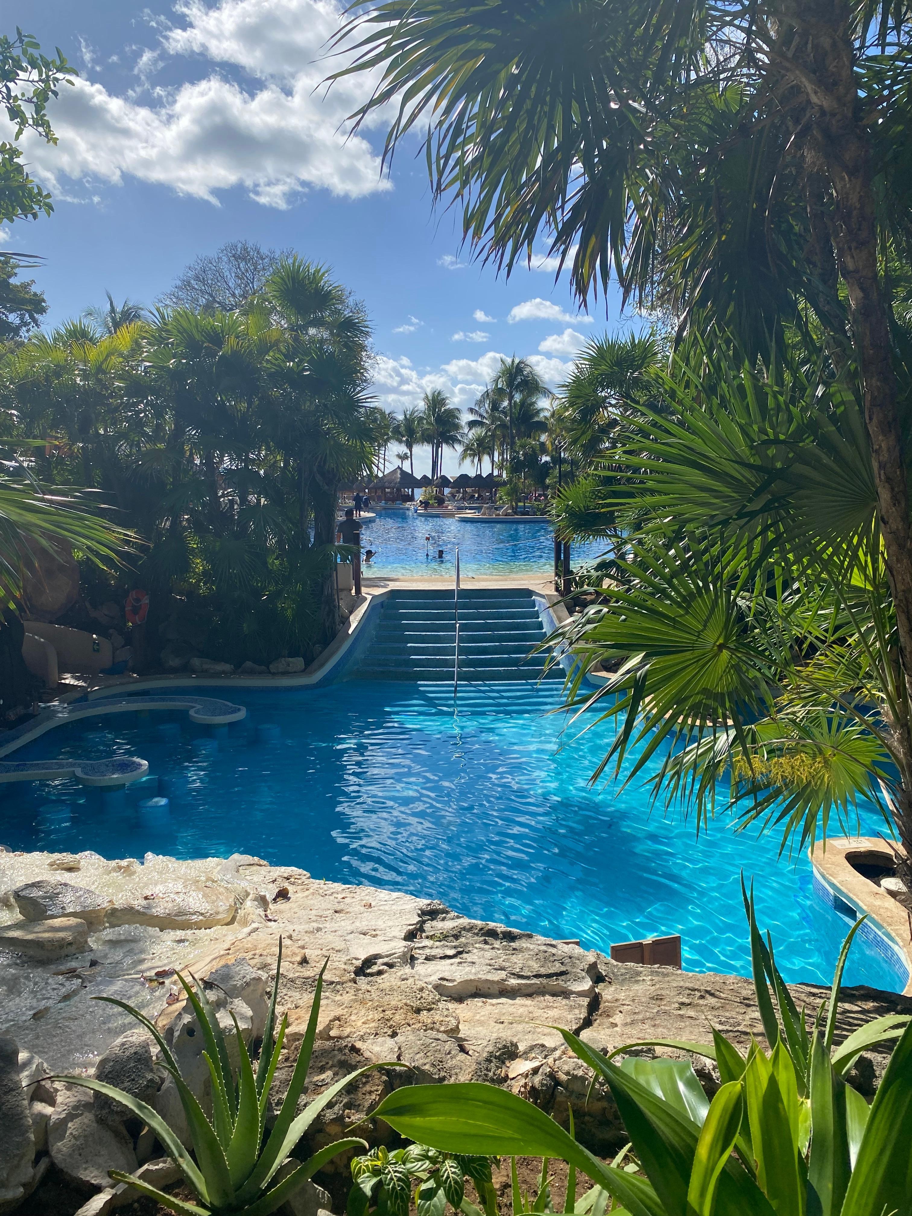 Adults only swim up bar pool and regular pool behind it