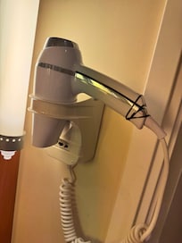 Hairdryer held together with a bit of black tape