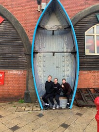 On the beach with there older sister