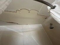 Ceiling above shower crumbling