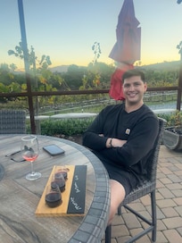 Wine tasting while listening to live music at Cheval Winery on property