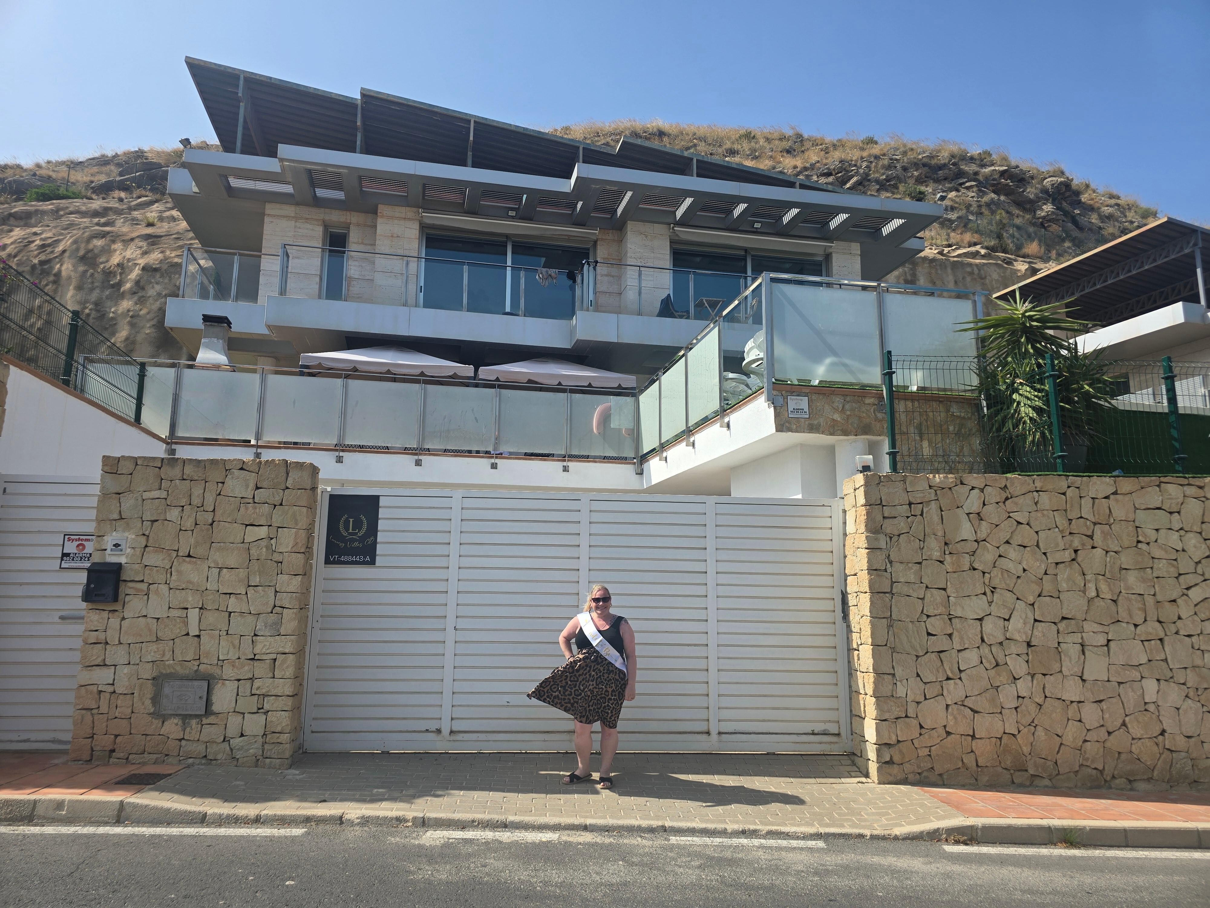 Carrie the hen in front of the villa x