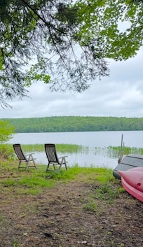 Chairs to relax down by the pond