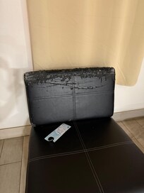 Peeling fake leather chair. Toss it in the dumpster!