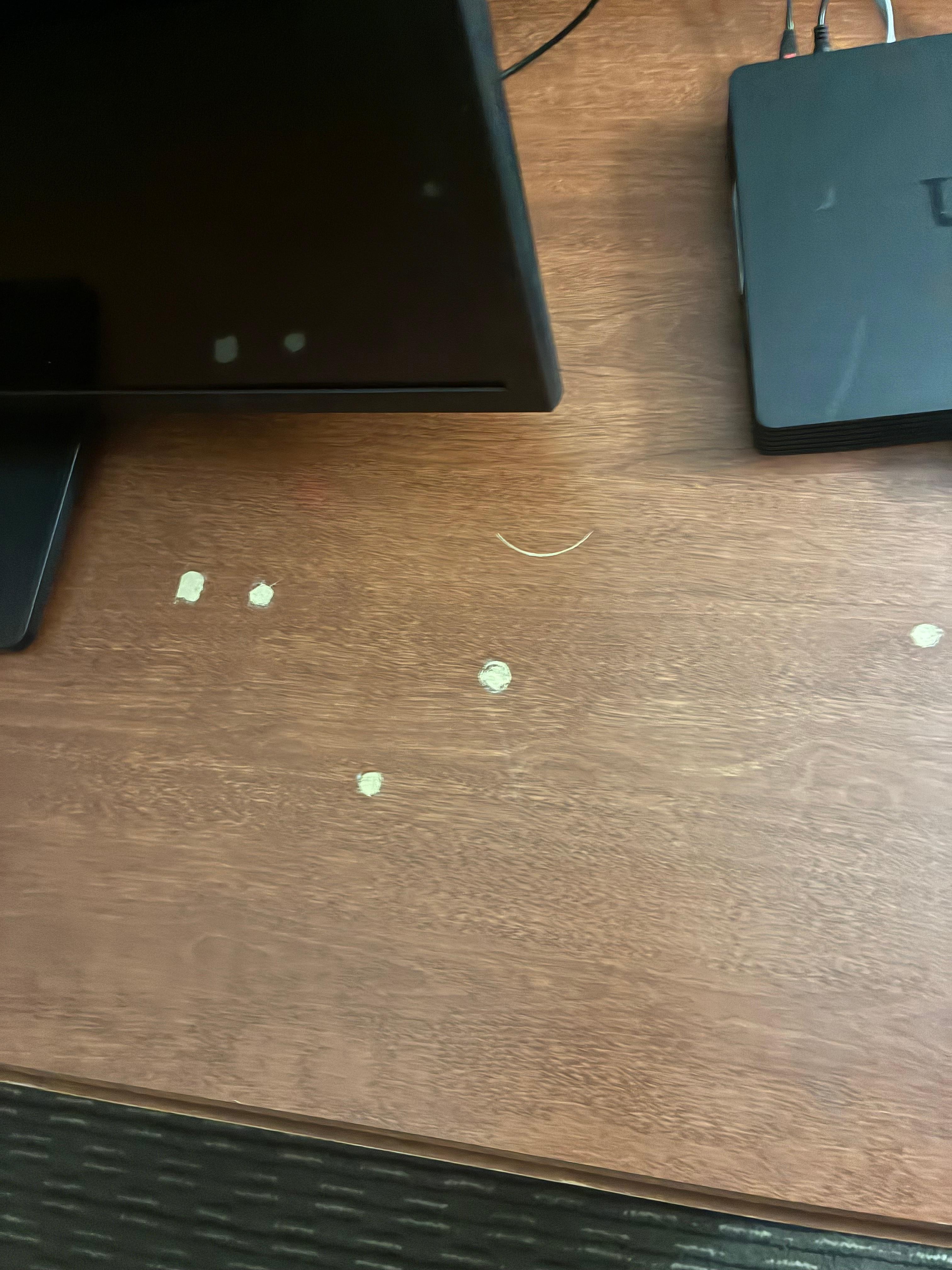 Chip marks on the table.