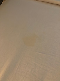 Clearly visibly stained. Should not have used until it was properly cleaned.