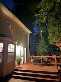 The backyard and deck are great spaces to relax.