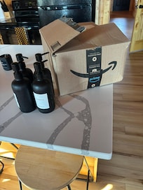 Box of cleaning supplies left on counter upon arrival.