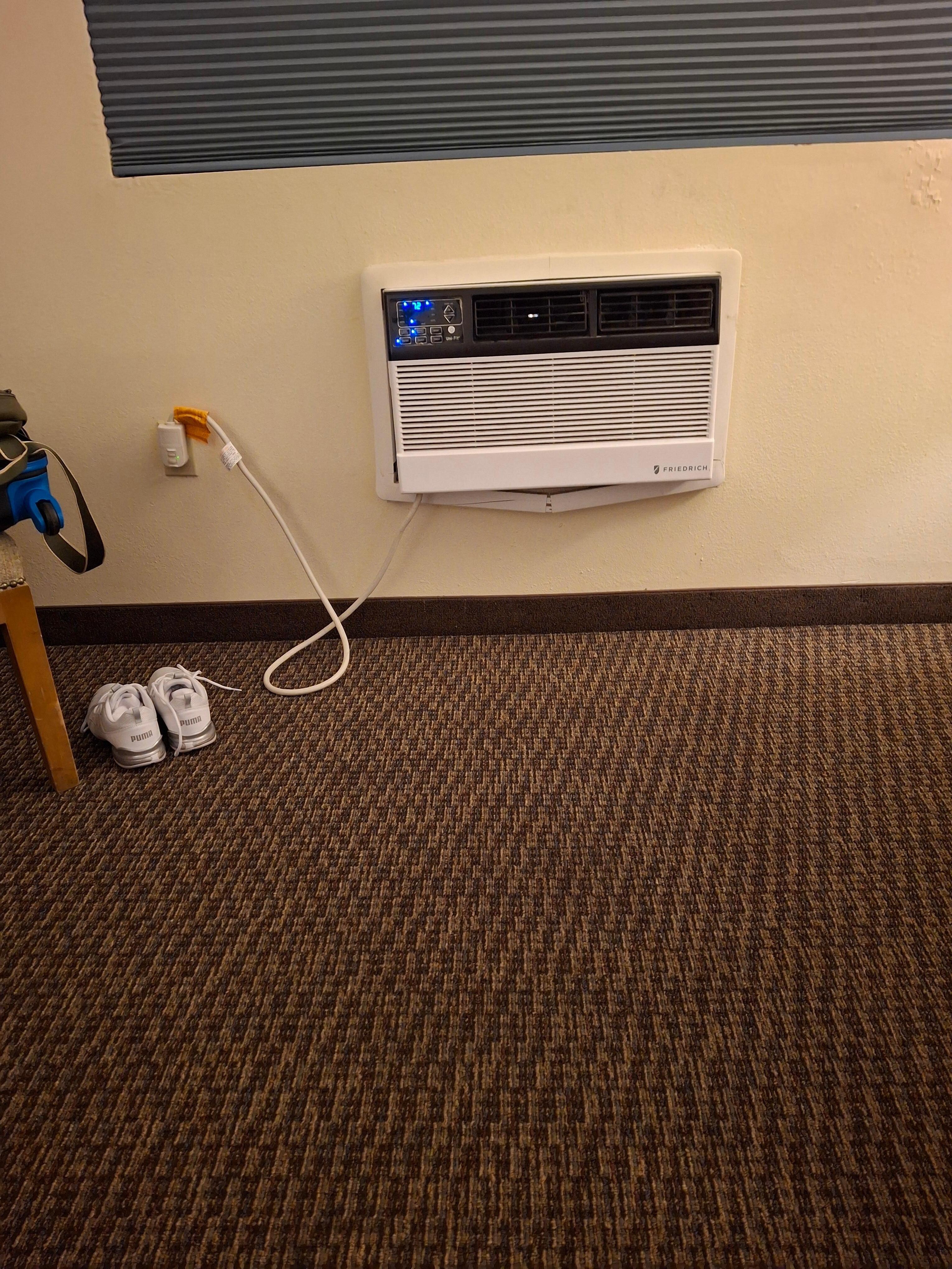 A/C unit not working properly. I attempted to lower the temperature and it didn't cool the room. 