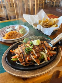 Sizzling fajitas just a short walk down the road at Vecina’s