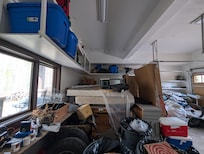 Garage full of junk, couldn't park a car