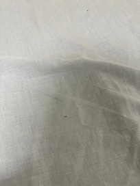 Sheets with black bits theoughout