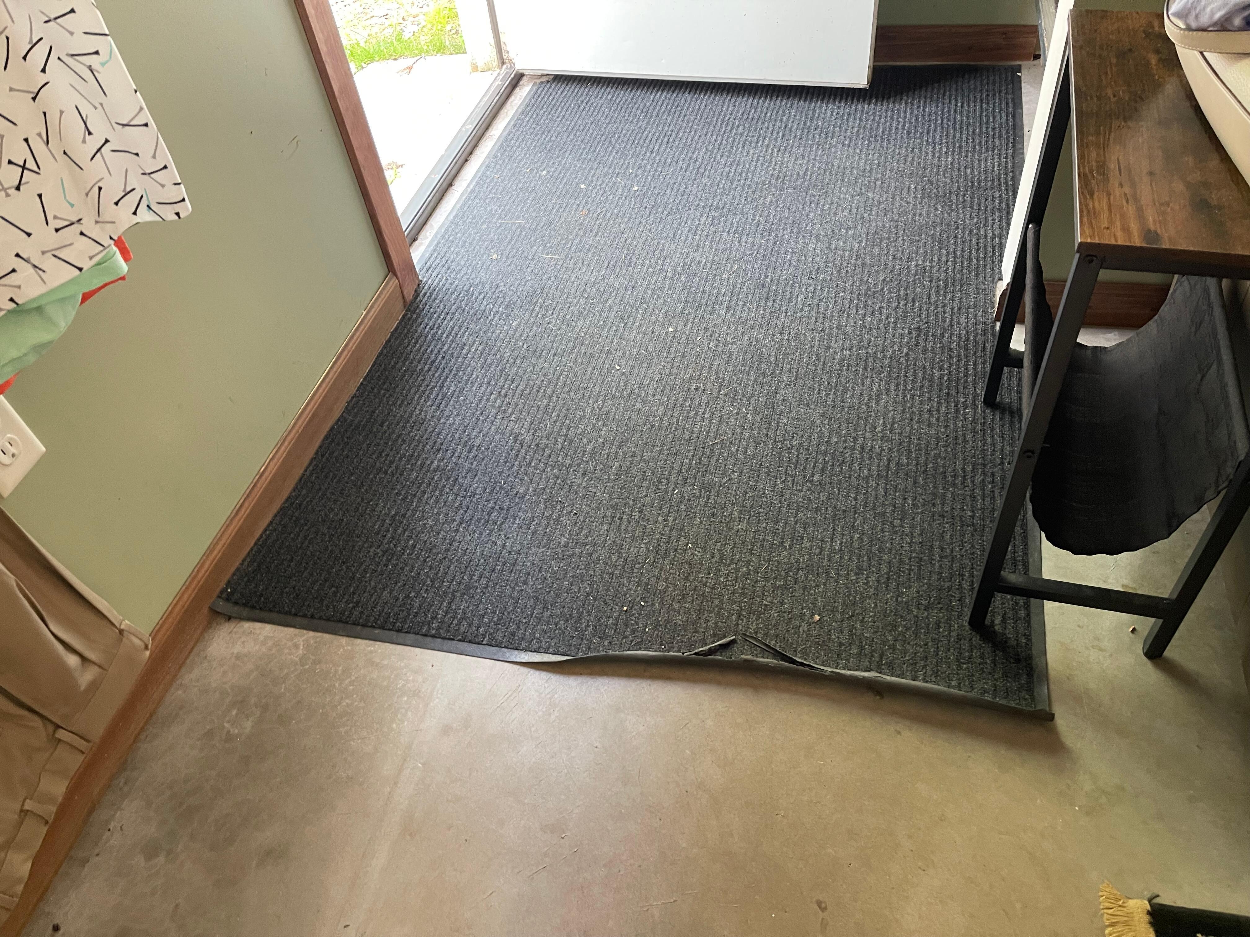 Worn out mat looking for a lawsuit (enlarge for view)