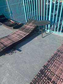 Pool area and sitting needs a lot of attention