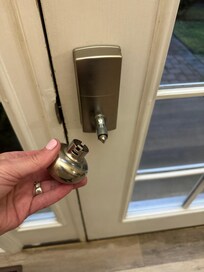 Front door knob broken.