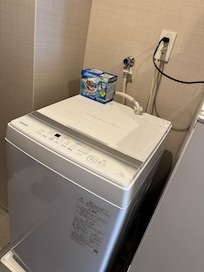 乾燥機能はないが洗剤までご用意あり
浴室には物干し竿とハンガーも