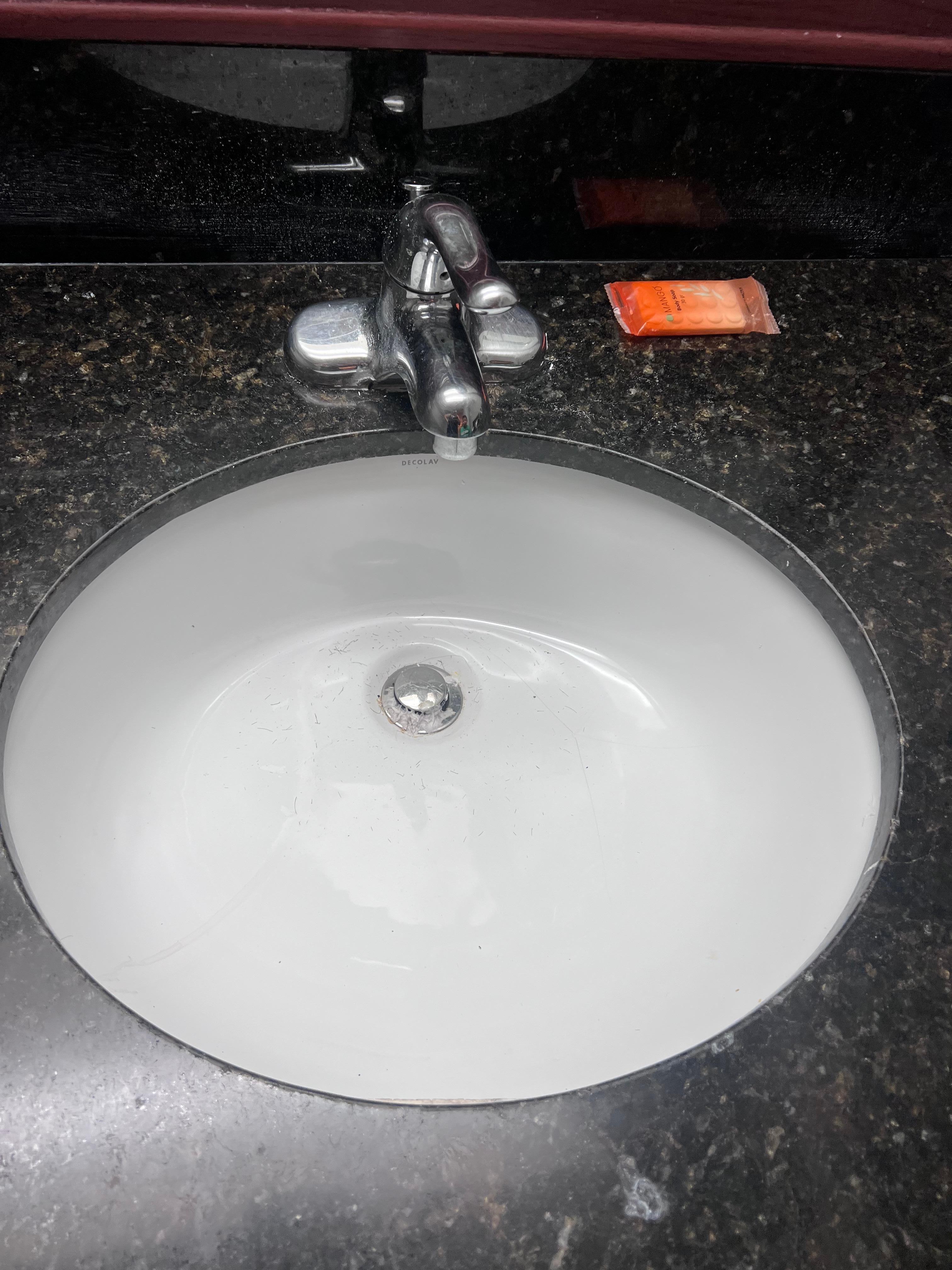 Dirty dusty sinks/floors/and walls.